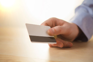 Image showing The male hand showing credit card