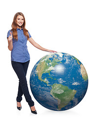 Image showing Woman in full length with earth globe