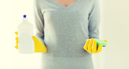 Image showing close up of woman with sponge and cleanser