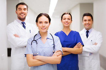 Image showing happy group of medics or doctors at hospital