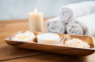 Image showing close up of soap, himalayan salt and scrub in bowl