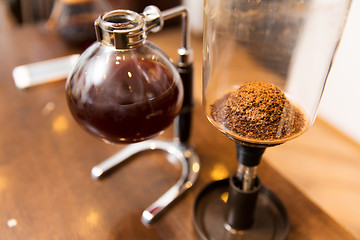 Image showing close up of siphon vacuum coffee maker at shop