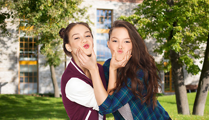 Image showing happy smiling teenage student girls having fun