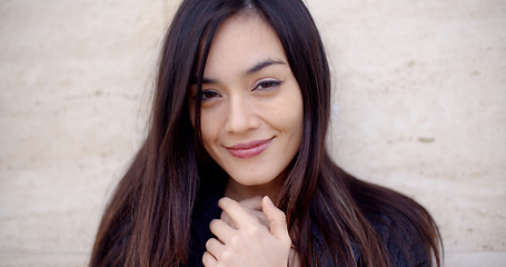Image showing Pretty young woman with a lovely friendly smile