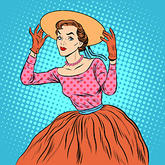 Image showing Flirty girl with a fashionable hat