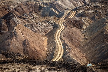 Image showing Large excavation site with roads ahead