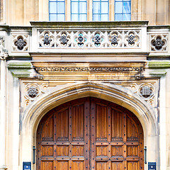 Image showing parliament in london old church door and marble antique  wall