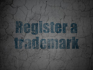 Image showing Law concept: Register A Trademark on grunge wall background