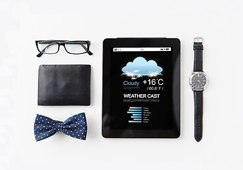 Image showing tablet pc with weather cast and personal stuff