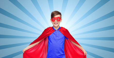 Image showing boy in red super hero cape and mask