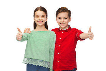 Image showing happy boy and girl showing thumbs up