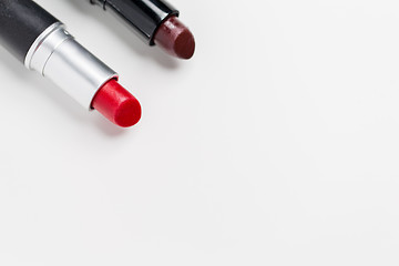 Image showing close up of two open lipsticks