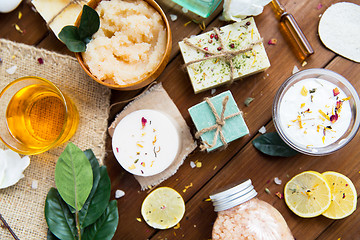 Image showing close up of body care cosmetic products on wood