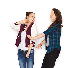 Image showing happy smiling pretty teenage girls dancing