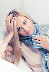 Image showing diseased woman with cup of tea