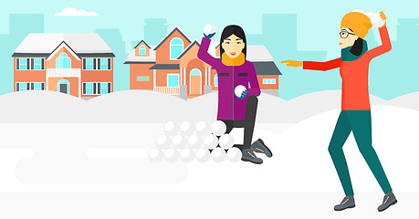 Image showing Women playing in snowballs.