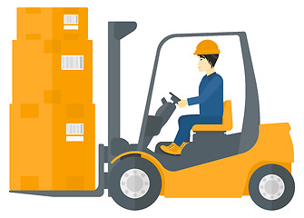 Image showing Worker moving load by forklift truck.