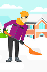 Image showing Man shoveling and removing snow.