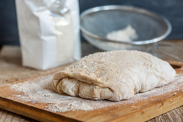 Image showing Dough on a floured table.