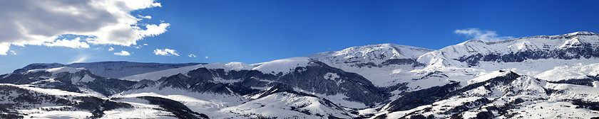 Image showing Panoramic view on snowy mountains at nice sun day