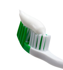 Image showing Green toothbrush with toothpaste