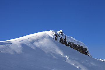 Image showing Top of mountains with snow cornice after snowfall