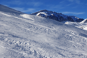 Image showing Off-piste slope at sun windy day