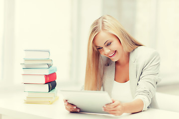 Image showing student with books and tablet pc