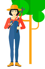 Image showing Farmer with pruner.