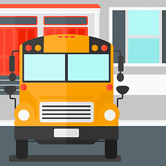 Image showing Yellow bus on the background of school building.