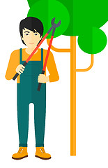 Image showing Farmer with pruner.