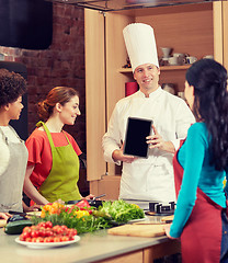 Image showing happy women with chef and tablet pc in kitchen