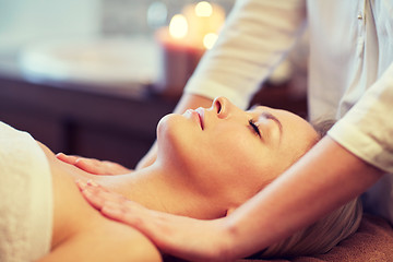 Image showing close up of woman lying and having massage in spa