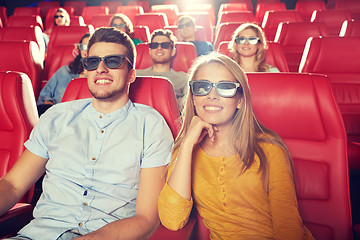 Image showing happy friends watching movie in 3d theater