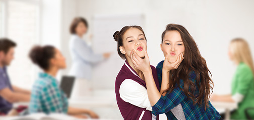 Image showing happy teenage student girls having fun at school