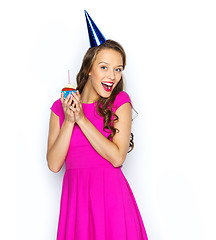 Image showing happy woman or teen girl with birthday cupcake