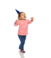 Image showing happy little baby girl with birthday party hat