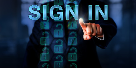 Image showing Entrepreneur Pointing at SIGN IN Onscreen