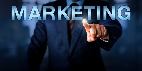 Image showing Marketeer Pointing At MARKETING Onscreen