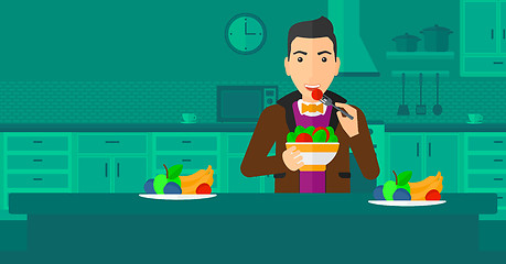 Image showing Man eating salad.