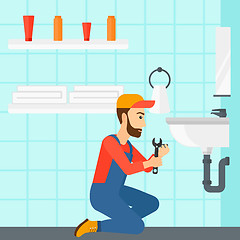 Image showing Woman repairing sink.