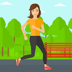 Image showing Sportive woman jogging.