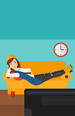 Image showing Woman lying on sofa.