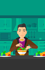 Image showing Man cooking meal.