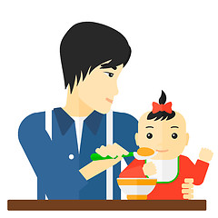 Image showing Man feeding baby.