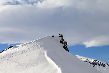 Image showing Top of mountains with snow cornice after snowfall