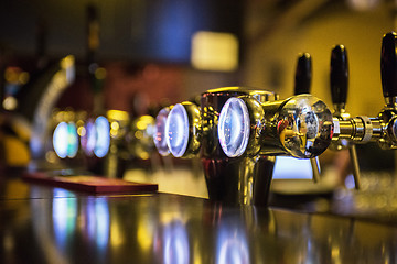 Image showing Metallic beer taps