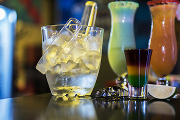 Image showing cocktails on bar background