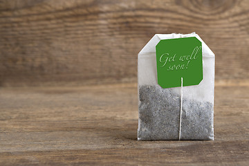 Image showing Teabag on wooden background, get well soon