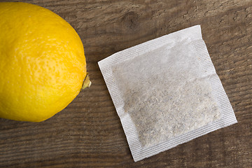 Image showing Lemon teabag on wooden background